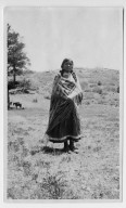 Jicarilla Apache woman in native costume
