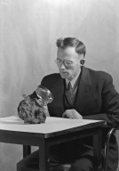 H.H. Nininger studying specimen