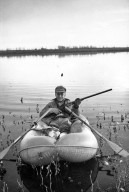 Alfred M. Bailey in rubber boat