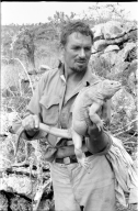 Carl Angermeyer with Iguana