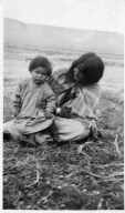 Portrait of a Ute woman with a child
