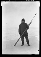 Jim Allen and a whaling dart gun in Wainwright, Alaska