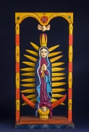 Colorful wood carving of the Virgin Mary.