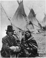 Rat Dog and family, Sioux, with native tipis