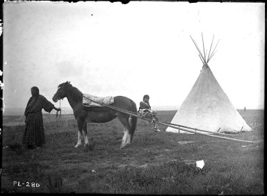 Travois and horse led by squaw