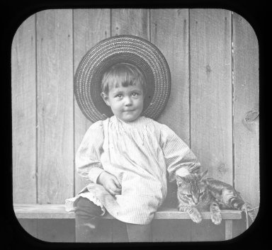 Toddler with cat