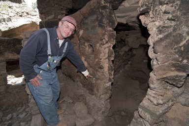 Dr.Steve Nash points out a feature at the Hinkle Park Cliff Dwelling site.