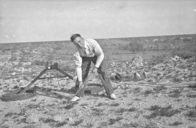 H.H. Nininger digging up a 'find'