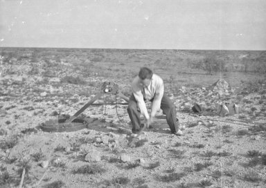 H.H. Nininger digging up a 'find'