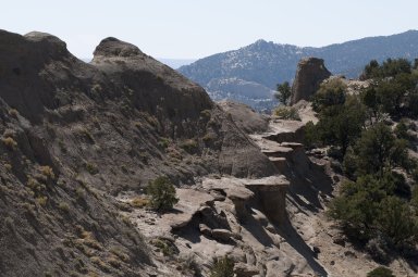 Rock shelves and hoodoos near the top of a ridgeline on the Kaiparowits Plateau.