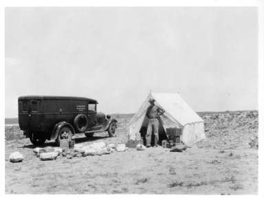 Man in front of tent, Horsetail Creek excavation