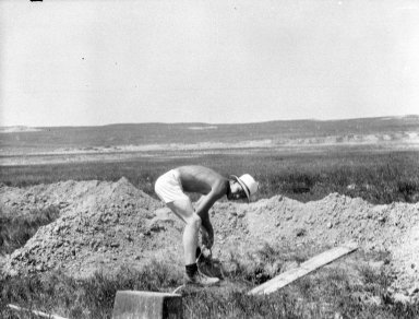 Workers at unidentified dig
