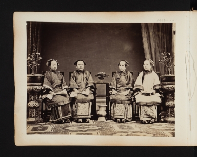 Four seated oriental women with fans.