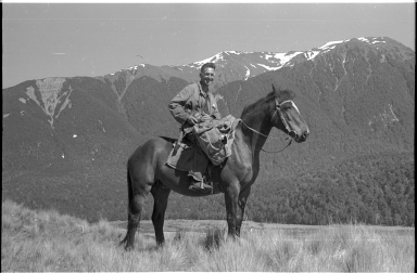Dick Morris on horseback near Lewis Pass