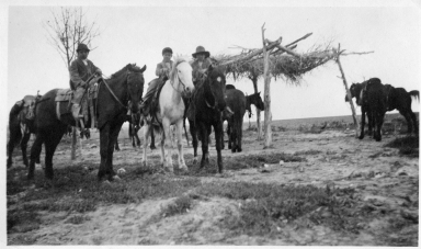 Portrait of Ute boys on horseback