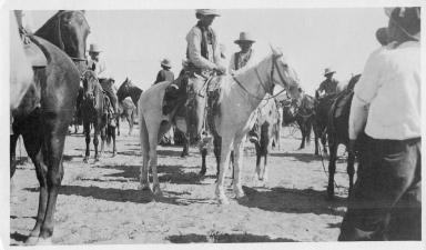 Portrait of Ute men on horseback