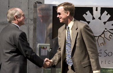 George Sparks and Mayor John Hickenlooper shake hands