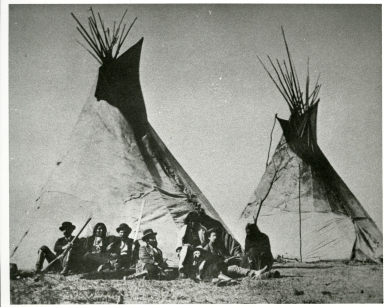 Plains Indian camp scene with White Hunters