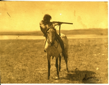 Indian with rifle